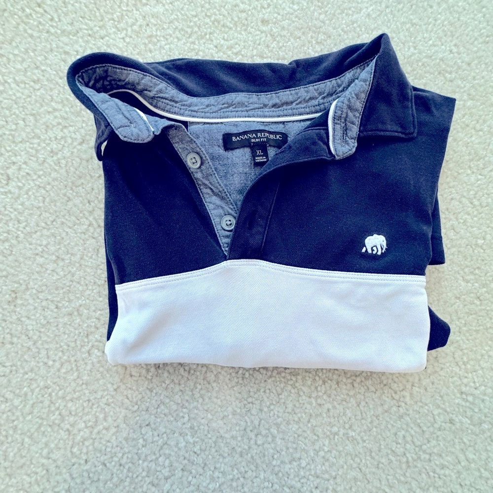 Blue and white polo shirt.